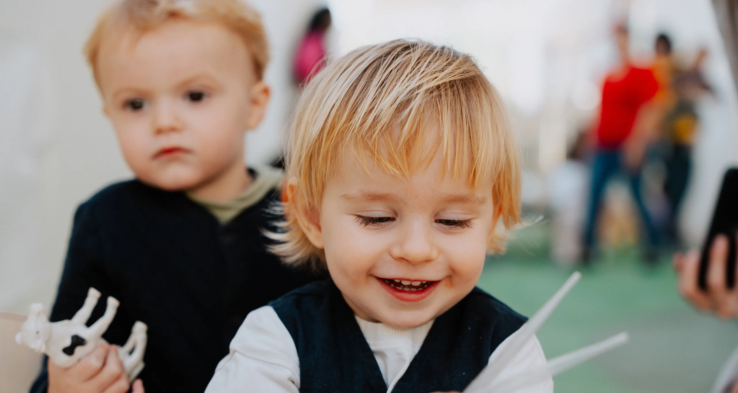 Two happy boys playing together (2)@2x.a821f5db
